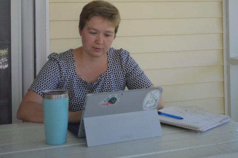 Nancyrose sitting on the computer doing research